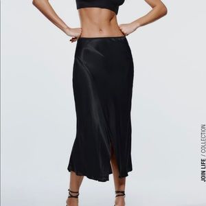 Zara black skirt with slit. BRAND new with tags.